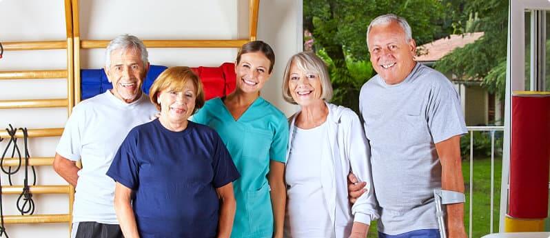 group of elderlies with a physical therapist